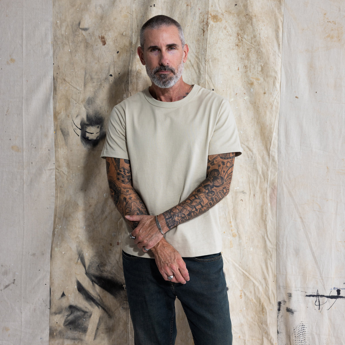 Premium Fitted Heritage Tee in Heritage Sand, front view on model, three quarter